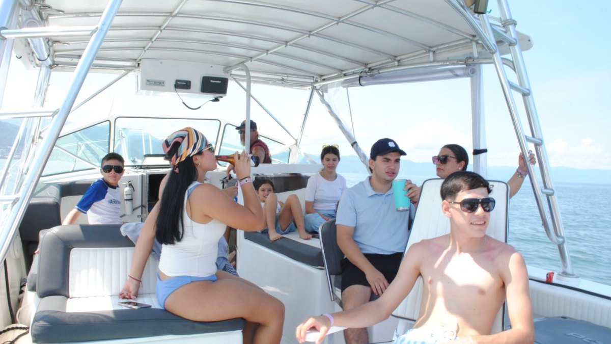 Guests aboard a private charter boat in Nuevo Vallarta